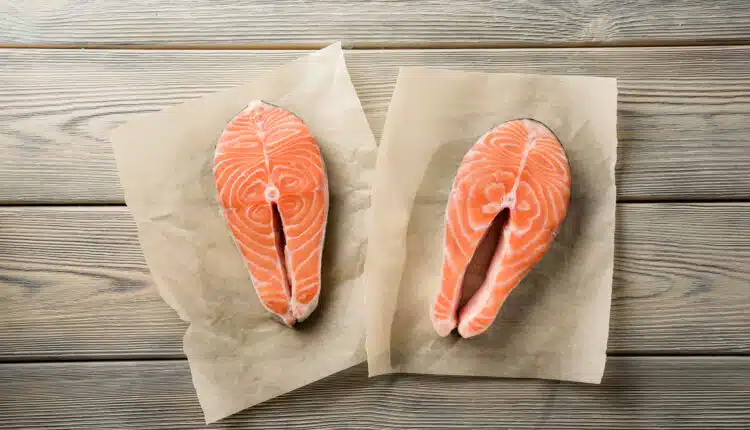 Red fish steaks, shot from above.